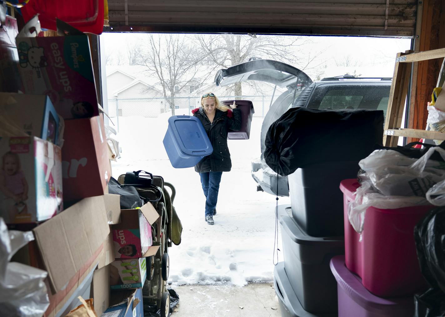 Anita Ewald dropped off some containers to her storage unit in Coon Rapids, Minn., on Friday, March 1, 2019. Ewald keeps her holiday decorations, presents and her six kids' school stuff and old clothes at her storage unit. ] RENEE JONES SCHNEIDER &#xa5; renee.jones@startribune.com