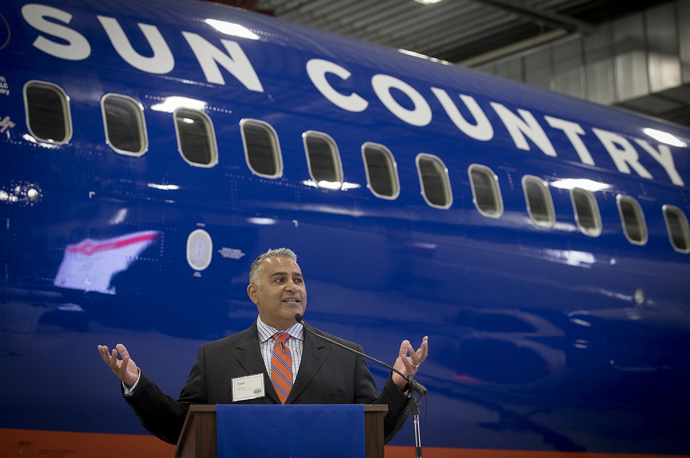 Sun Country Airlines President & CEO Zarir Erani spoke before revealing that the airline is naming each of its airplanes after a different lake in Minnesota during a dedication ceremony, Tuesday, April 11, 2017 in Bloomington, MN.