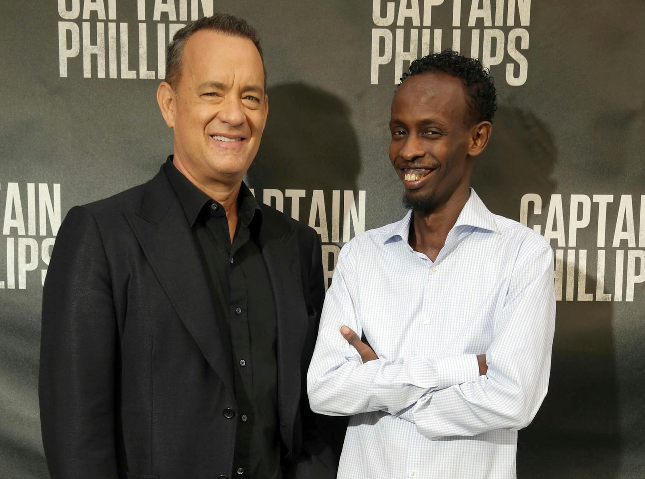 IMAGE DISTRIBUTED FOR SONY PICTURES - Tom Hanks and Barkhad Abdi at Columbia Pictures "Captain Phillips" Photo Call held at the Four Seasons Hotel on Monday, September 30, 2013 in Beverly Hills, CA. (Photo by Eric Charbonneau/Invision for Sony Pictures/AP)
