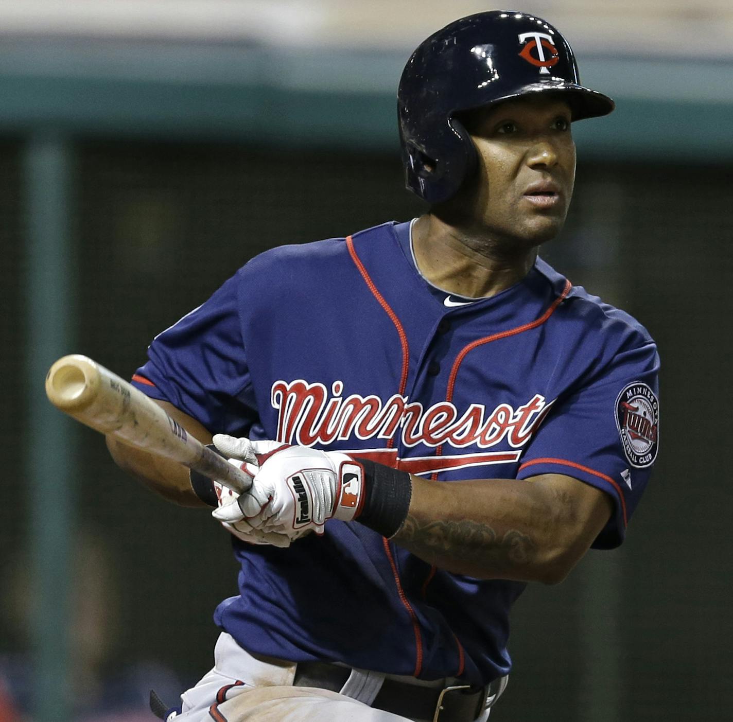 Minnesota Twins' Danny Santana doubles off Cleveland Indians relief pitcher John Axford in the ninth inning of a baseball game Wednesday, May 7, 2014, in Cleveland. The Indians won 4-3 on a game-winning single by Mike Aviles in the bottom of the ninth. (AP Photo/Mark Duncan)