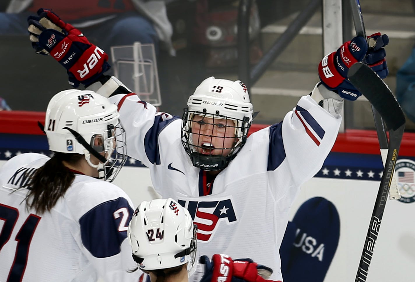 Kelli Stack (16), of team USA celebrated with teammates Hilary Knight (21) and Josephine Pucci (24) after scoring a goal in the first period. ] CARLOS GONZALEZ cgonzalez@startribune.com - December 28, 2013, St. Paul, Minn., Xcel Energy Center, Women's Hockey, USA vs. Canada