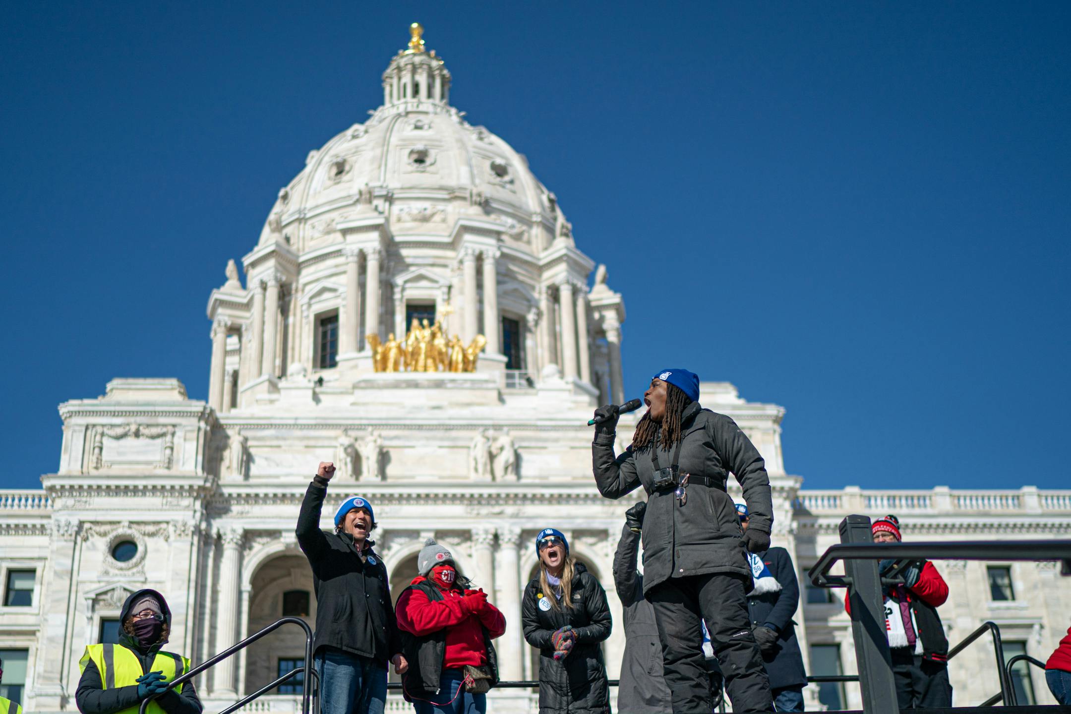 With tears streaming down her cheeks, Marcia Howard, a teacher at Roosevelt High School, spoke at the rally as Twin Cities teachers including MFT, Minneapolis Federation of Teachers Local 59, and ESP, Education Support Professionals, rallied at the Minnesota State Capitol.