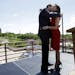 Former Minnesota Governor Tim Pawlenty kisses his wife Mary after she introduced him at a town hall meeting Monday, May 23, 2011, at the State of Iowa