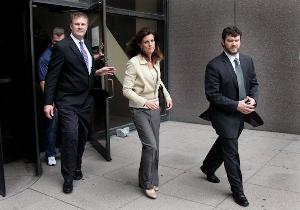 Amy Senser, center, was convicted in the Aug. 23, 2011, death of Anousone Phanthavong.