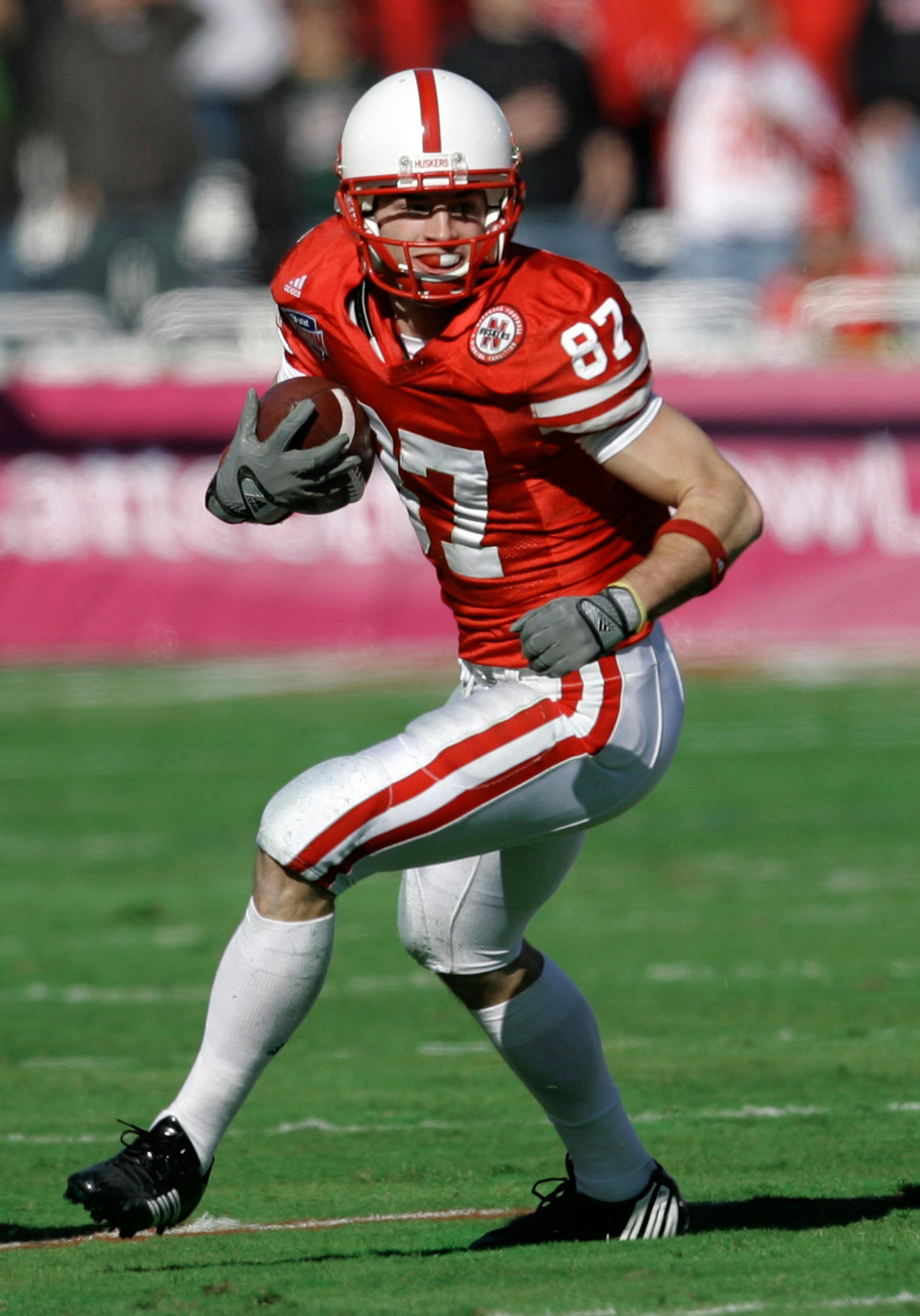 This file photo from Jan. 1, 2007, shows Nebraska wide receiver Nate Swift carrying the ball against Auburn in the Cotton Bowl college football game in Dallas. Swift is among at least a half-dozen players recruited by former Nebraska coach Frank Solich, which are projected starters and several others that should play major roles this season, the fourth under Bill Callahan.