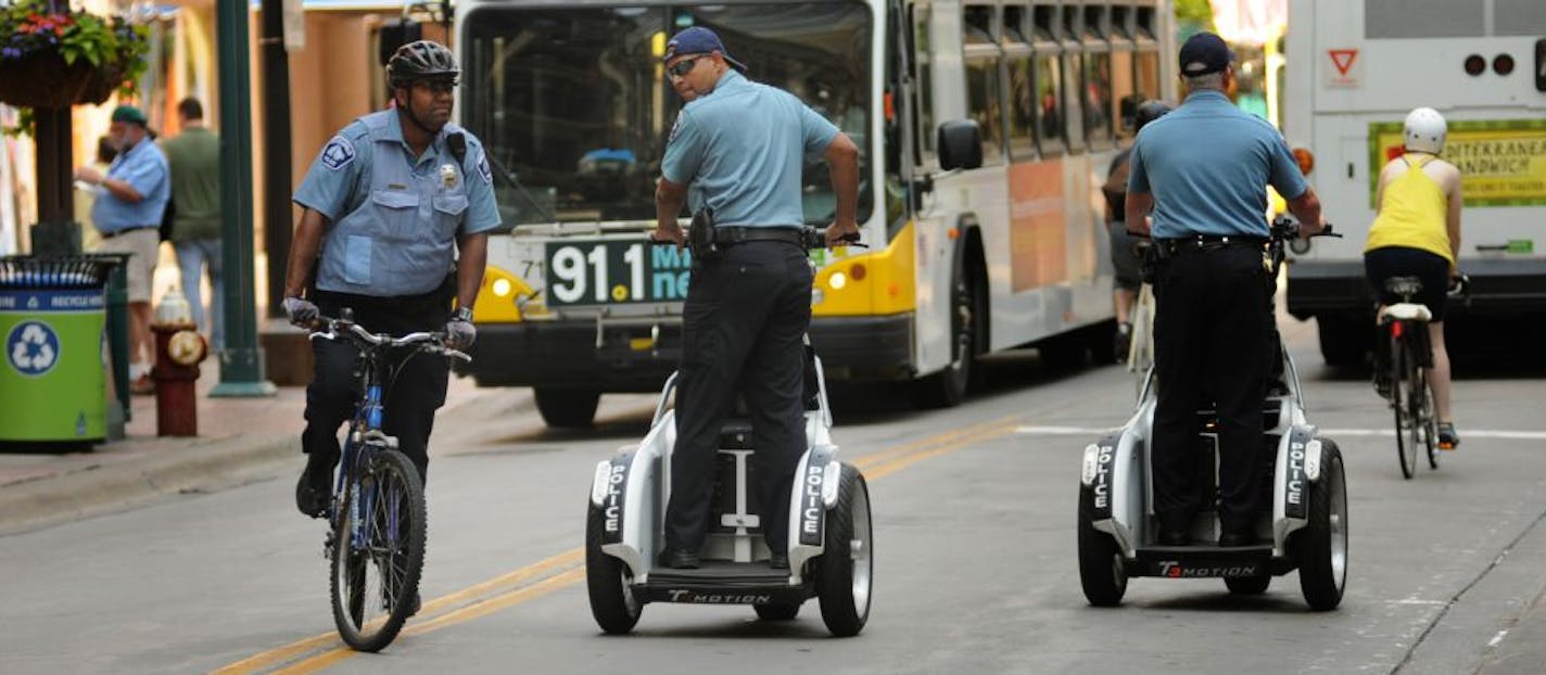 Mounted patrol officers rode horses, bicycles and Segways on Wednesday to show how they are trying to counter the image of danger in downtown Minneapolis.