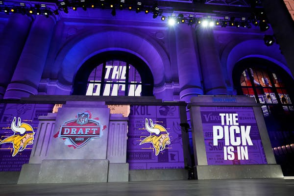 The onstage video screens display "The Pick Is In" for the Minnesota Vikings during the 2023 NFL Draft, Thursday, April 27, 2023, in Kansas City, Mo. 