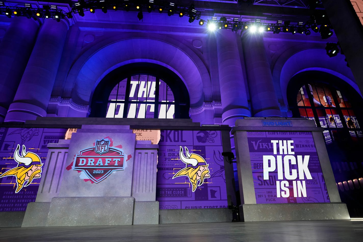 The onstage video screens display "The Pick Is In" for the Minnesota Vikings during the 2023 NFL Draft, Thursday, April 27, 2023, in Kansas City, Mo. (AP Photo/Steve Luciano)