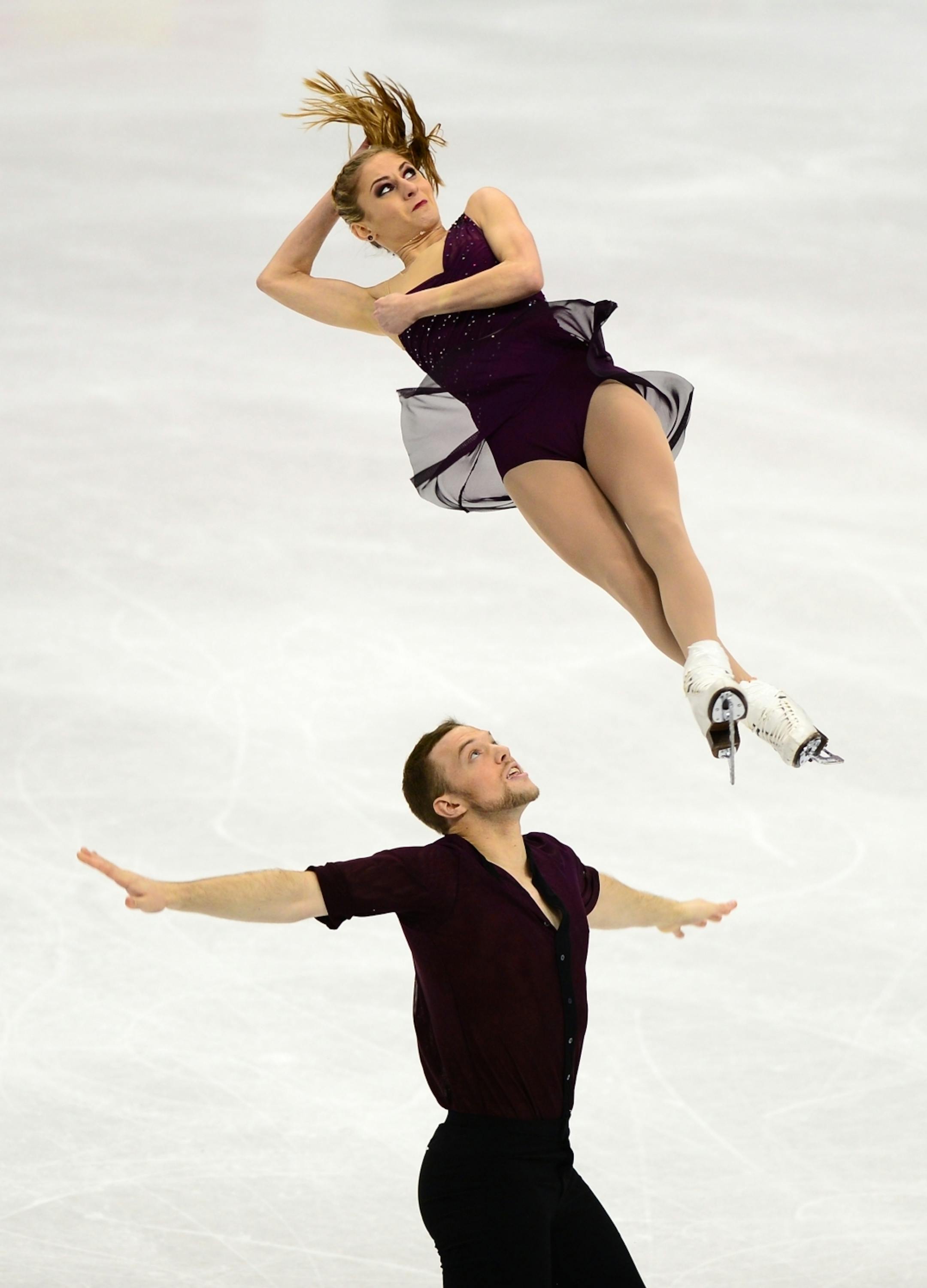 Danny O'Shea and Tarah Kayne executed the twist lift component of their championship pairs short program performance Thursday. The pair won first place with a score of 69.61.
