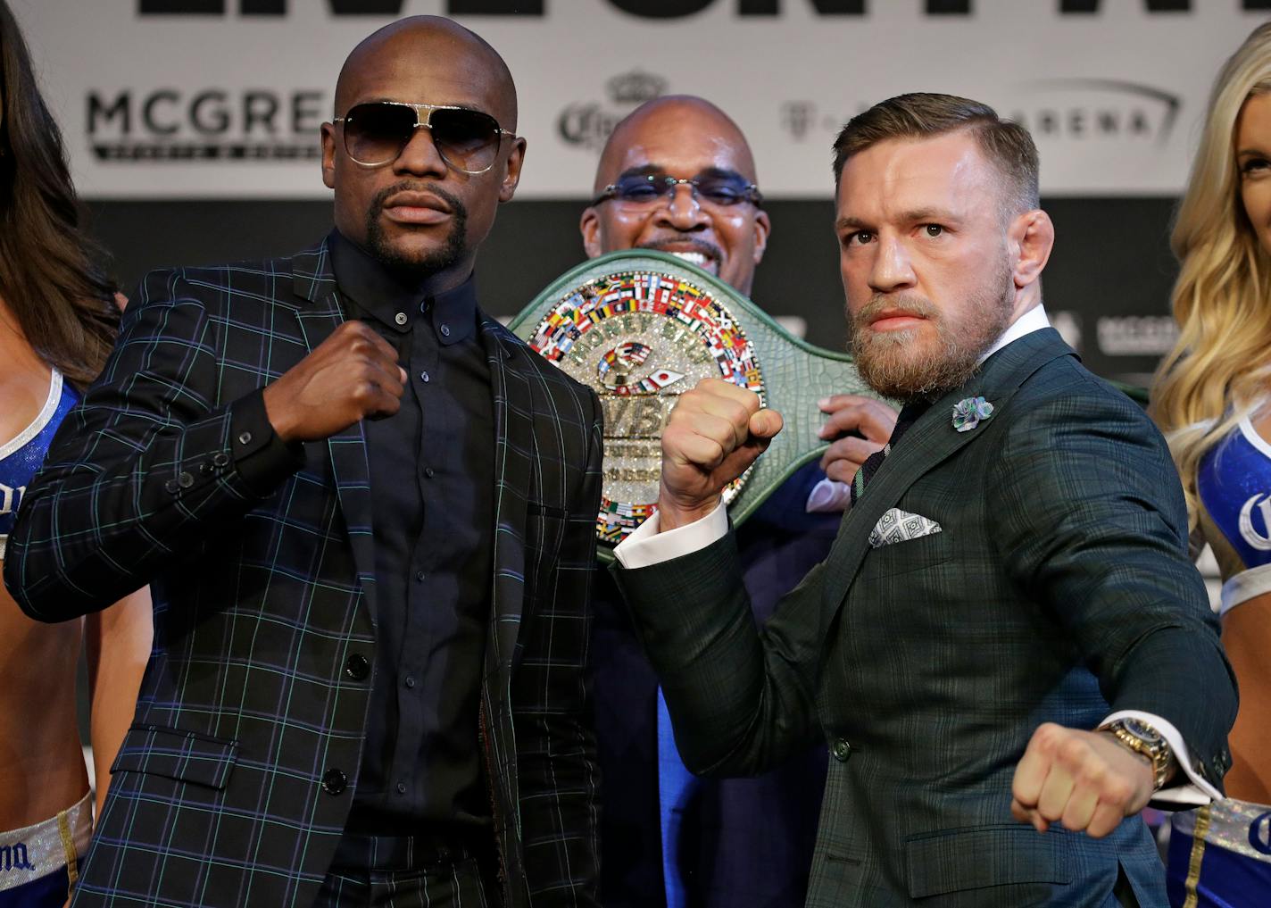 Floyd Mayweather Jr., left, and Conor McGregor