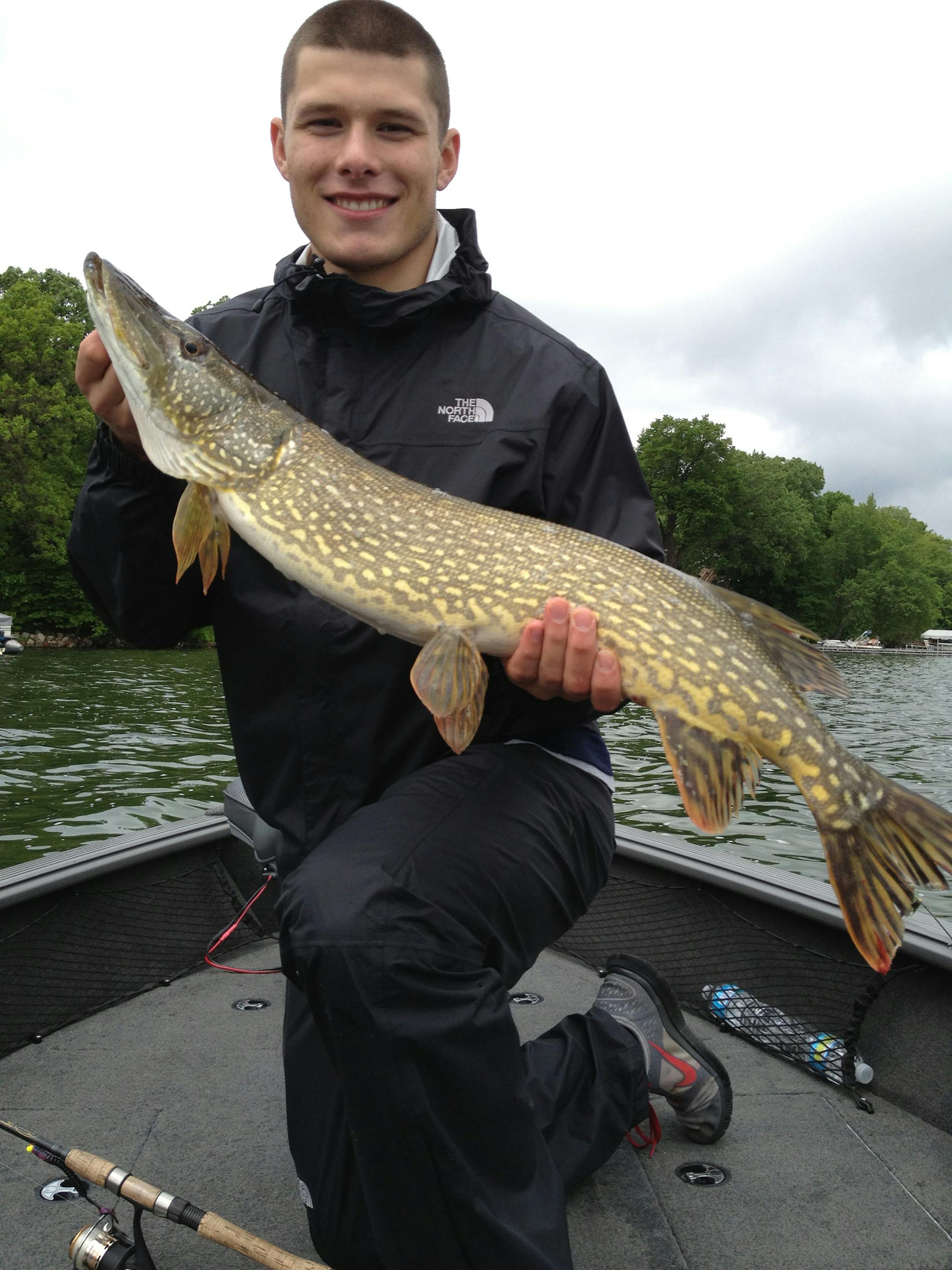 LAST CALL Zach Hartley of Minneapolis caught this 38-inch northern on Cedar Lake in Wright County. "I was catching largemouth bass in about 8-feet of water off a weed line, using a jig and fake minnow with 8-pound test line. We were leaving in 10 minutes, and I thought a huge bass or walleye hit my line. I was surprised when I got this to the boat. We took photos and released it.''