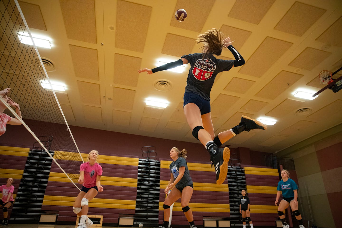 Jordan Mitchell jumped up for a spike during Denfeld High School volleyball practice on Tuesday.