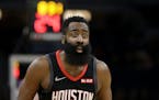 Houston Rockets guard James Harden looks at an official in the first quarter of a basketball game against the Minnesota Timberwolves Saturday, Nov. 16