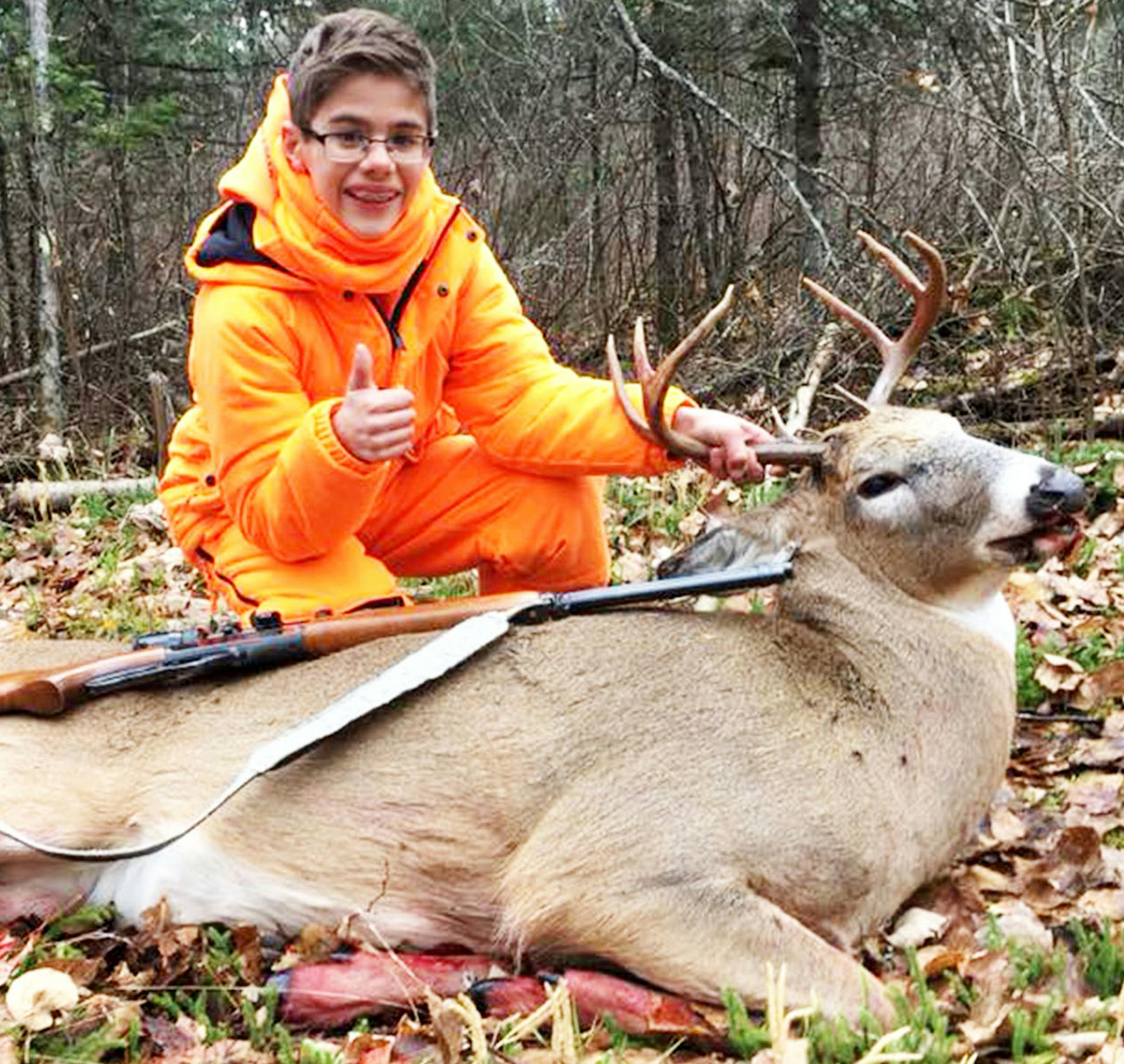 Gavin Moss, 11, of Cottage Grove, was hunting with family members on public land in St. Louis County when he harvested his first deer with a single shot. The buck was 35 yards away and Gavin shot it through the heart. ORG XMIT: 9wDSBOSSSfc0XaV1eA3W