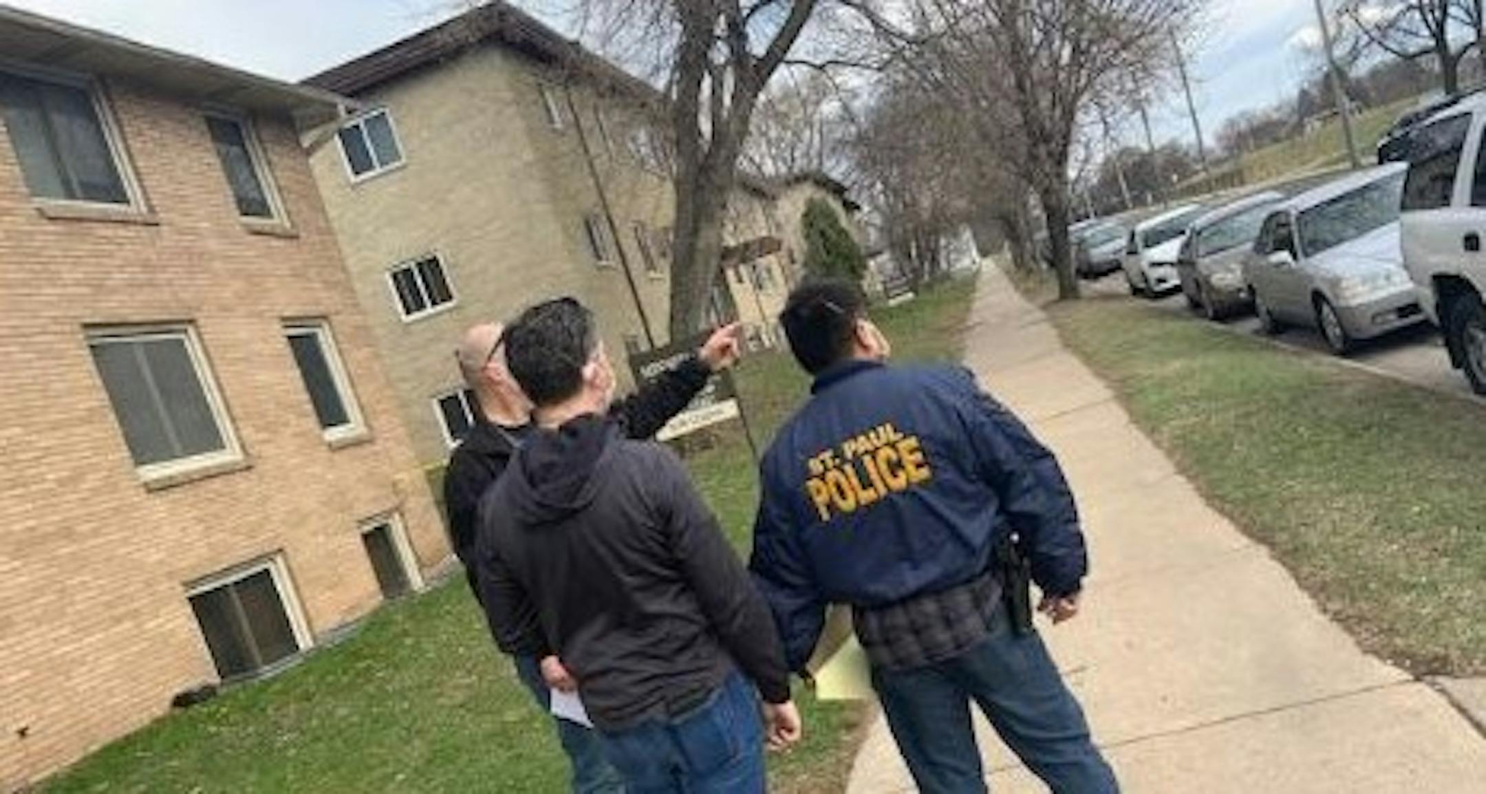 Photo courtesy of St. Paul police: Investigators worked at the scene of a shooting death Saturday afternoon on E. Minnehaha Av. in St. Paul.