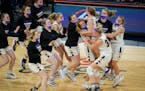 Chaska celebrated its 45-43 win against Rosemount for the 4A championship on Friday night.