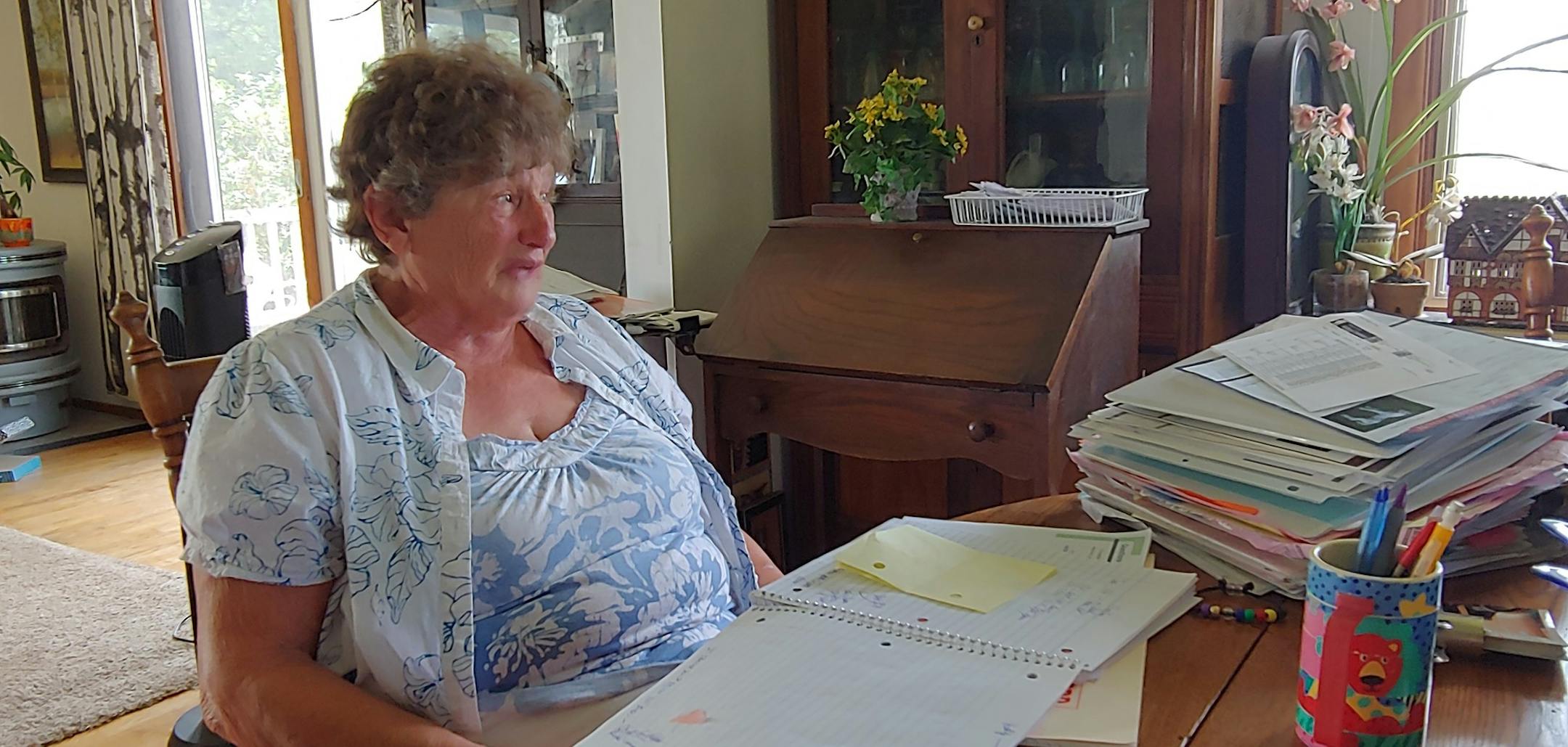 Ann Bowman cries as she tells about euthanizing a favorite horse on her southern Minnesota farm. The animal's illness prompted an investigation by the Animal Humane Society.