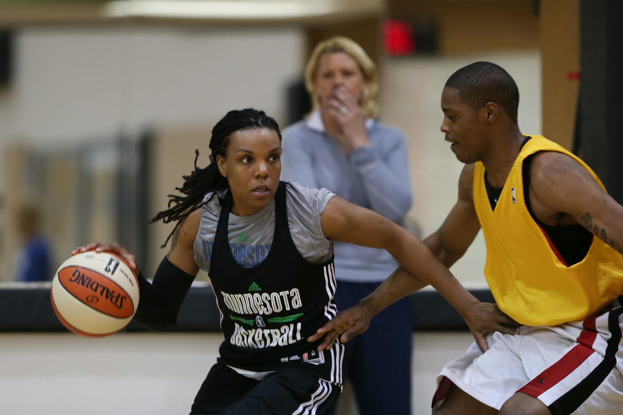 Guard Tan White ran a drill against a member of the Lynx practice squad Sunday afternoon as former Gopher women's basketball coach Pam Borton observed.