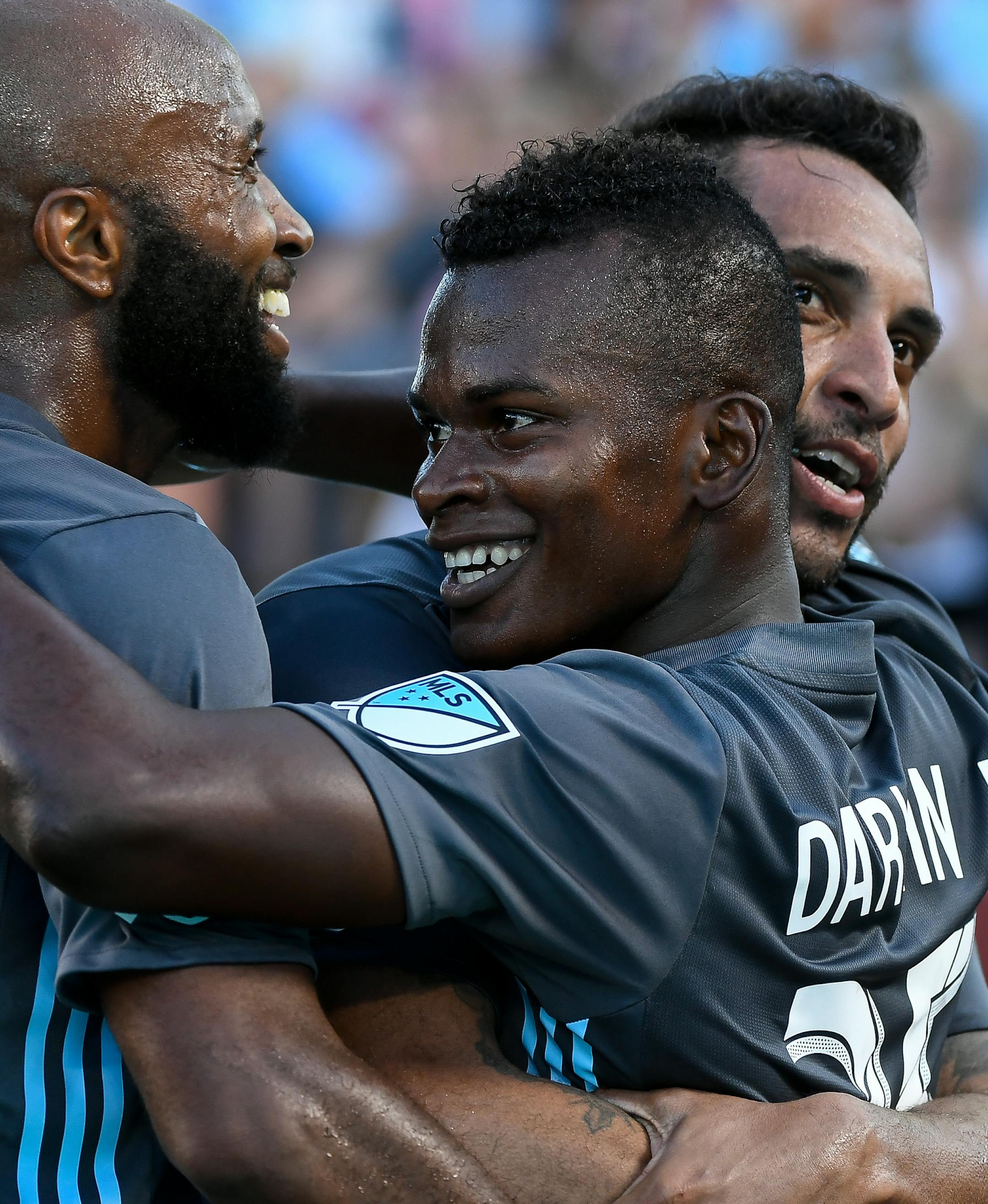 Minnesota United forward Carlos Darwin Quintero (25) celebrated with midfielder Collen Warner (26) and midfielder Ibson (7) after Quintero scored a second half goal against Real Salt Lake. ] AARON LAVINSKY ï aaron.lavinsky@startribune.com Minnesota United played Real Salt Lake on Saturday, July 14, 2018 at TCF Bank Stadium in Minneapolis, Minn.