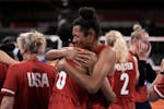 Players from the United States react after defeating Brazil in the gold medal match in women's volleyball at the 2020 Summer Olympics, Sunday, Aug. 8,