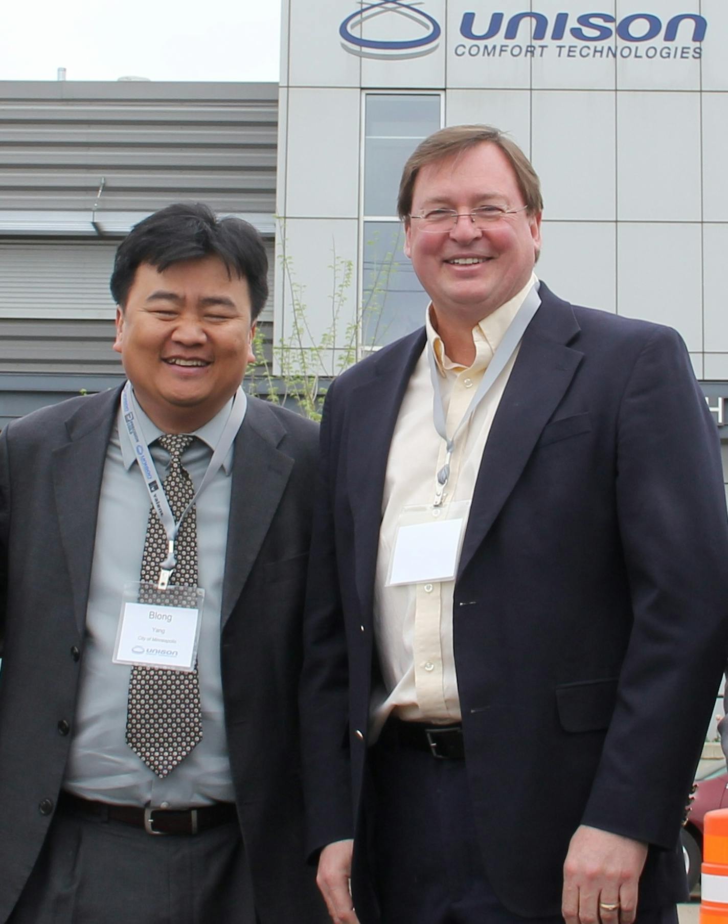 Unison Comfort Technologies of North Minneapolis celebrated a $5 million-plus plant expansion on May 8. Pictured (left-to-right) are:Jennifer White, policy aide to Council Member Barb Johnson, Council Member Blong Yang, Unison Presient Jay Althof and Kevin McKinnon of the Minnesota Department of Employment and Economic Development. , a manufacturer of commercial air-handling equipment, is completing an expansion in north Minneapolis that will drive employment to nearly 350 this year, an increase