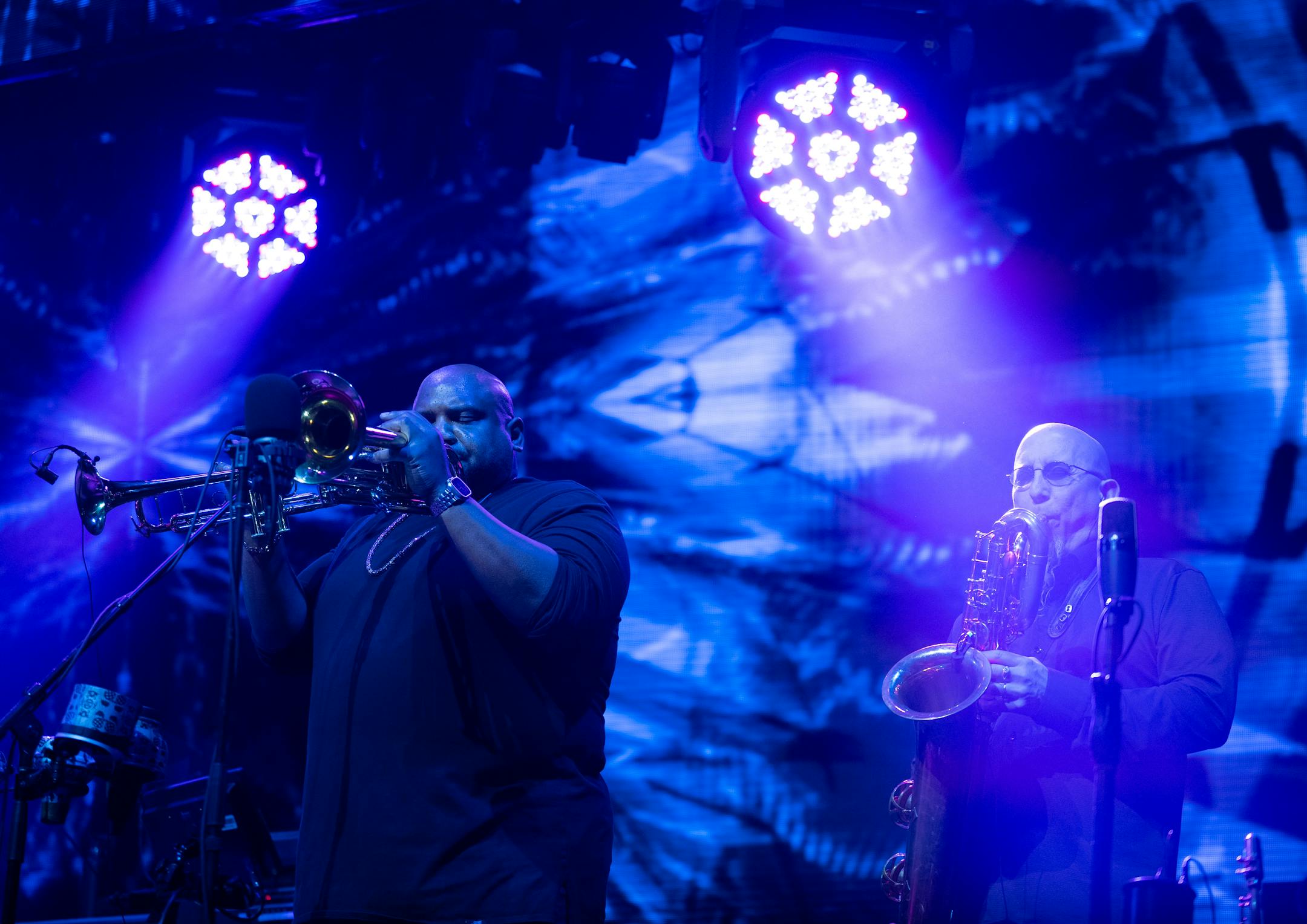 Rashawn Ross, left, on trumpets and Jeff Coffin on sax during a performance by the Dave Matthews Band.