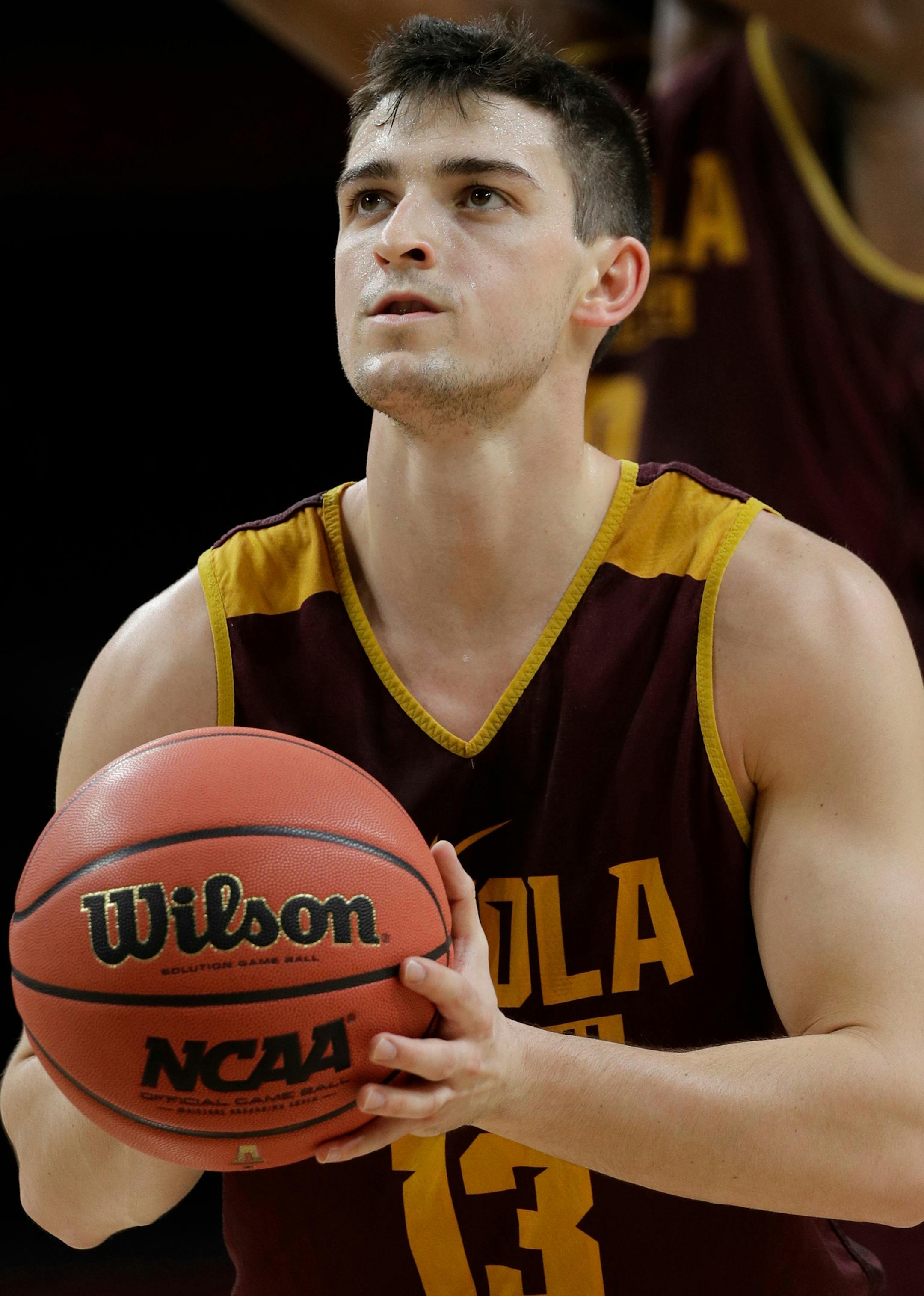 Loyola-Chicago's Clayton Custer (13) looks to shoot during a practice session for the Final Four NCAA college basketball tournament, Friday, March 30, 2018, in San Antonio. (AP Photo/David J. Phillip)