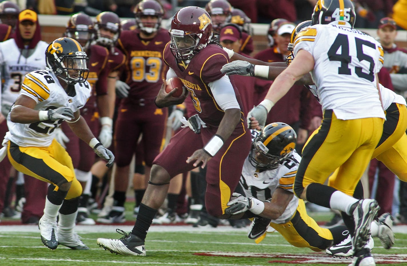 Minnesota Gophers vs. Iowa Hawkeyes football. Minnesota won 22-21. Gophers quarterback MarQueis Gray ran through the Iowa defense for some of his 62 rushing yards.