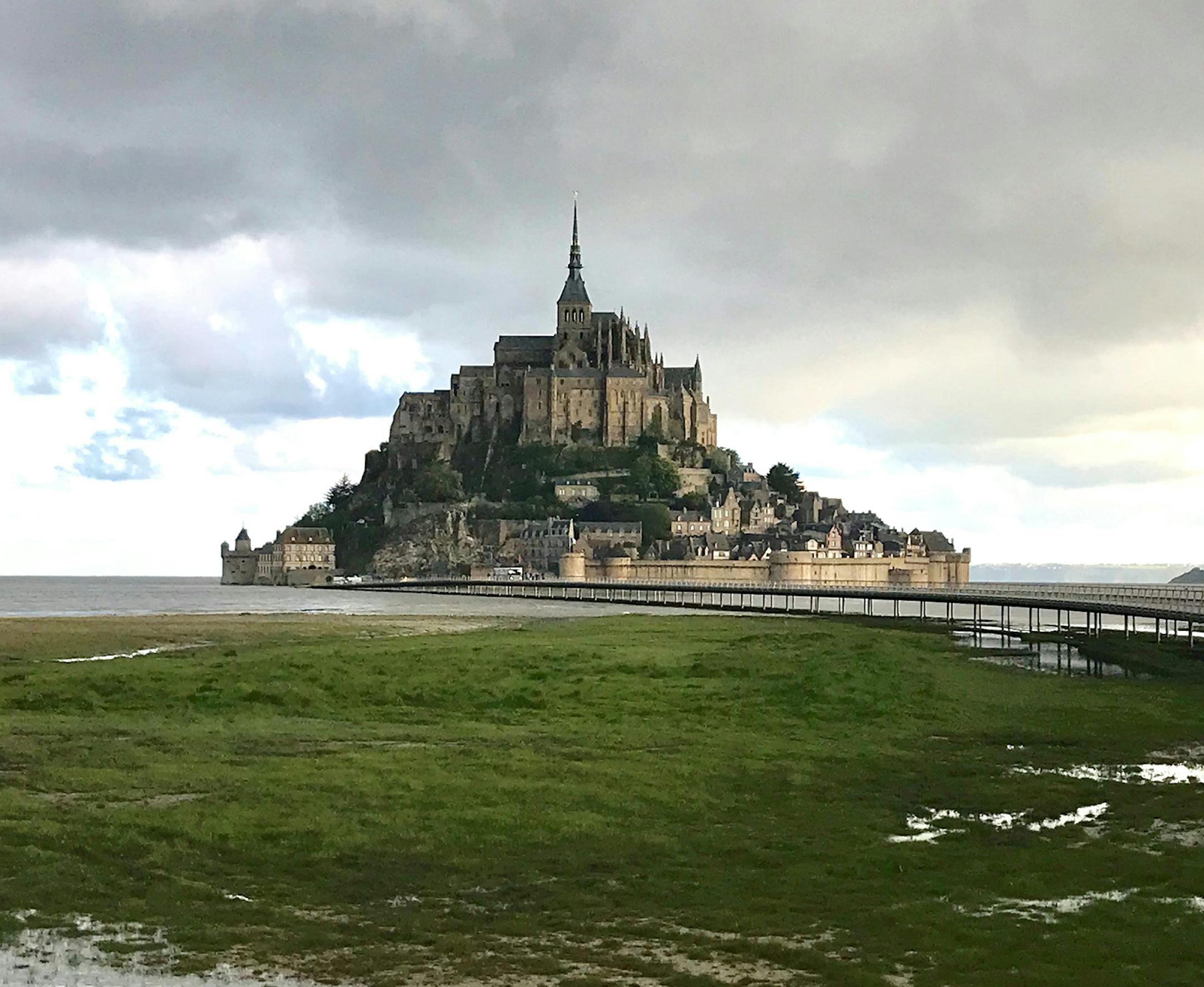 Rachel Dickinsen
Roseville, MN Where were you when you took this photo? My husband and I went to France for our ten year anniversary this spring. We started our trip with a drive through Normandy. I took this photo from the causeway between our hotel in La Caserne and Mont Saint-Michel. What does it show? This photo shows Mont Saint-Michel &#xf3; an island off the coast of Normandy fortified with medieval ramparts and a stunning abbey and monastery at the summit. What equipment did you use&#xf3;