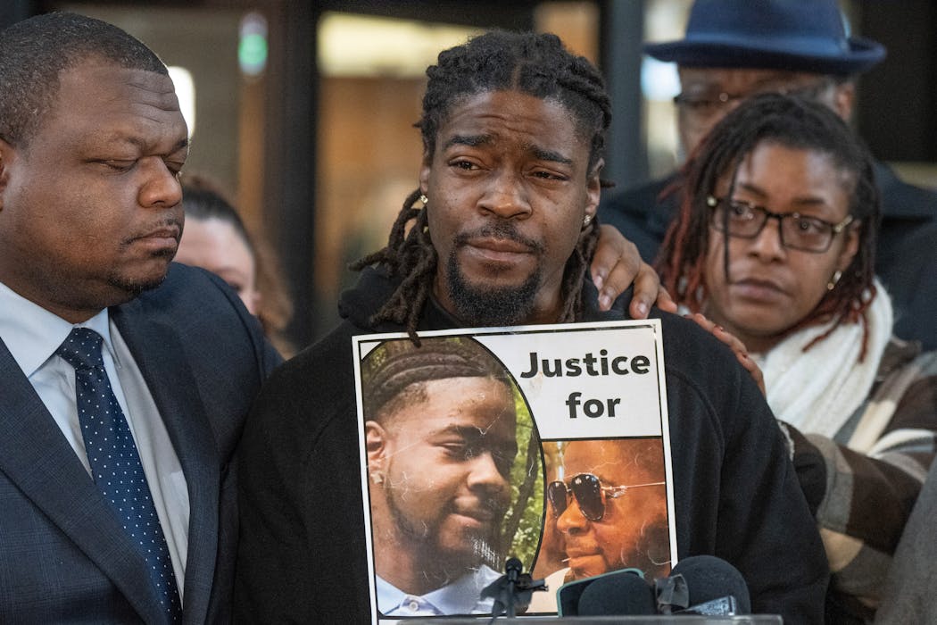 Rashad Cobb reflected Thursday on the life of his twin brother Ricky Cobb ll. At left is family lawyer Harry M. Daniels.