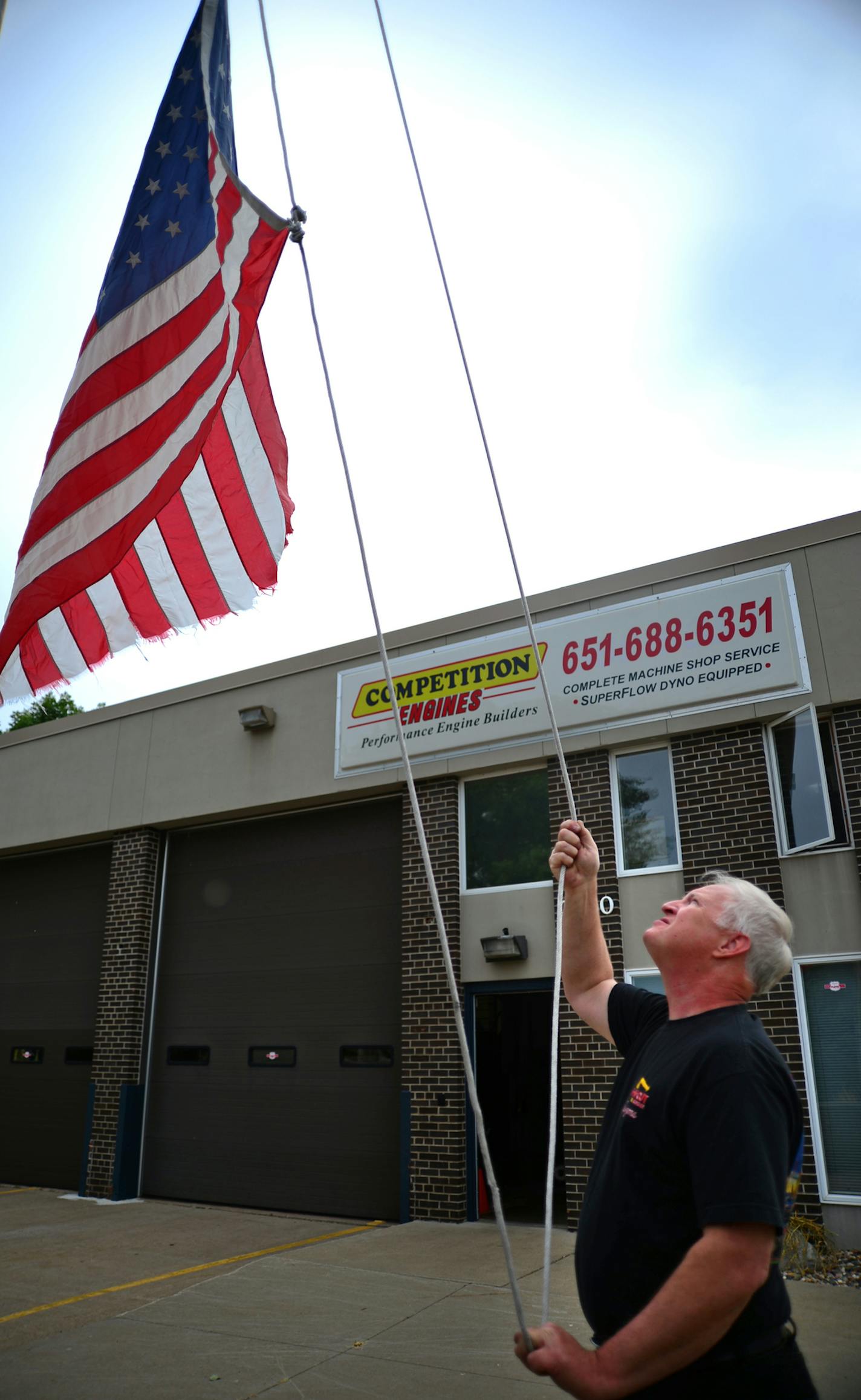 Old fire stations in Minneapolis and St. Paul have found new lives as funky restaurants, theaters and condos, but it's a much different story in the suburbs. Communities that have dealt with unloading old stations haven't found it easy to get them on the tax rolls. Randy Quam has taken over this old Eagan fire station and has based has Competition Engines business there. Every morning he hoists the American flag in front of the old fire house. ] Richard.Sennott@startribune.com Richard Sennott/St