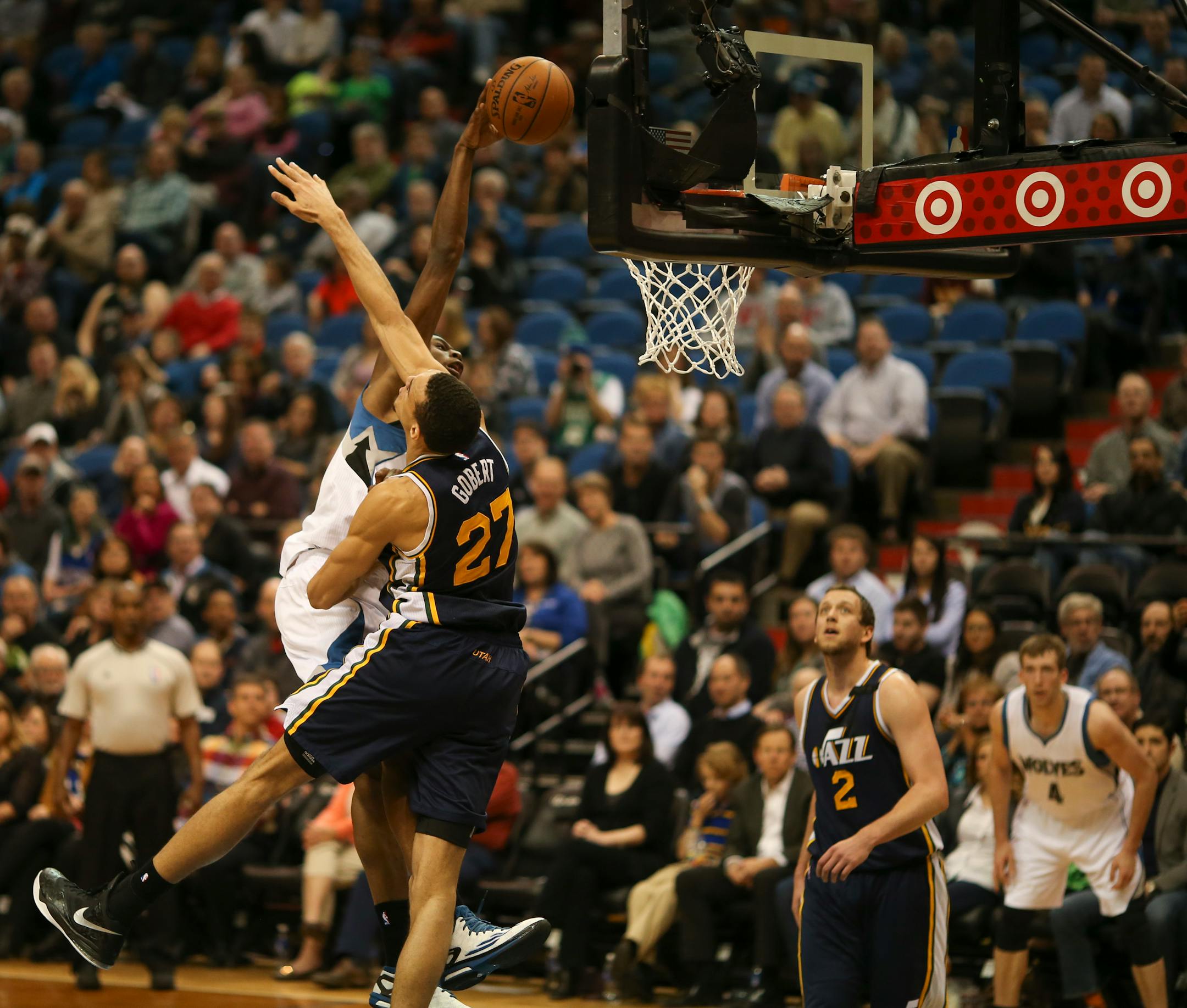 Wolves forward Andrew Wiggins dunked in the second quarter over Jazz center Rudy Gobert at Target Center on Monday night.