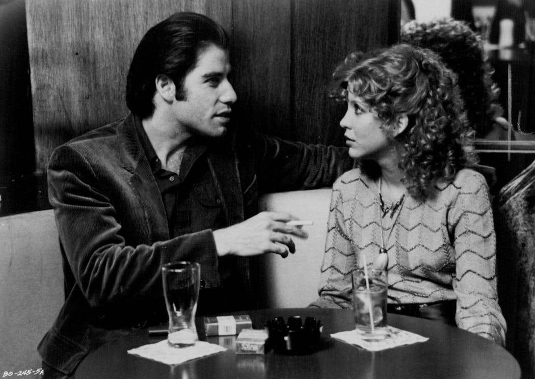 John Travolta and Nancy Allen in 