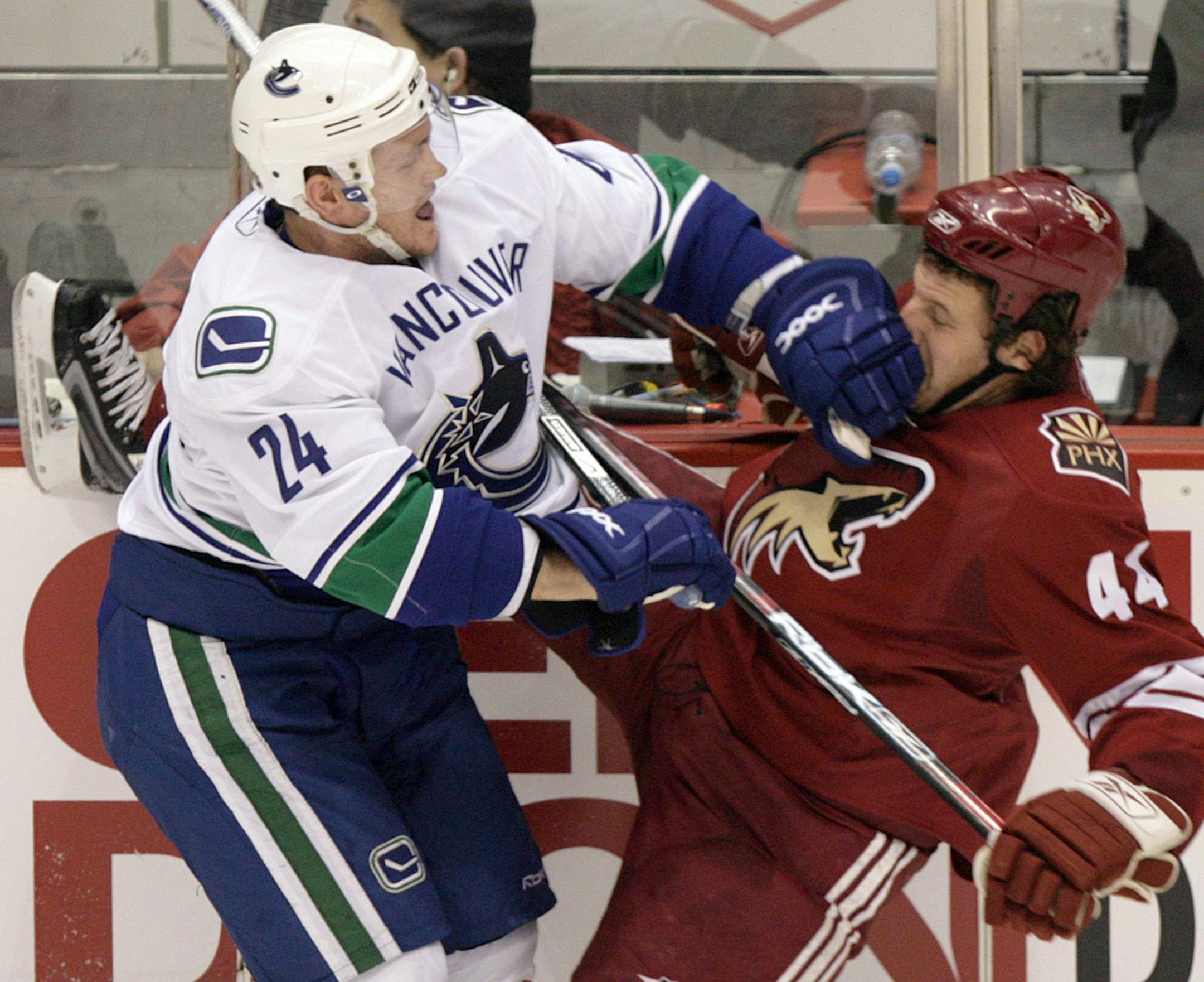 Matt Cooke earned his reputation as an agitator for the Vancouver Canucks, but he has changed his game and is trying to change his image.