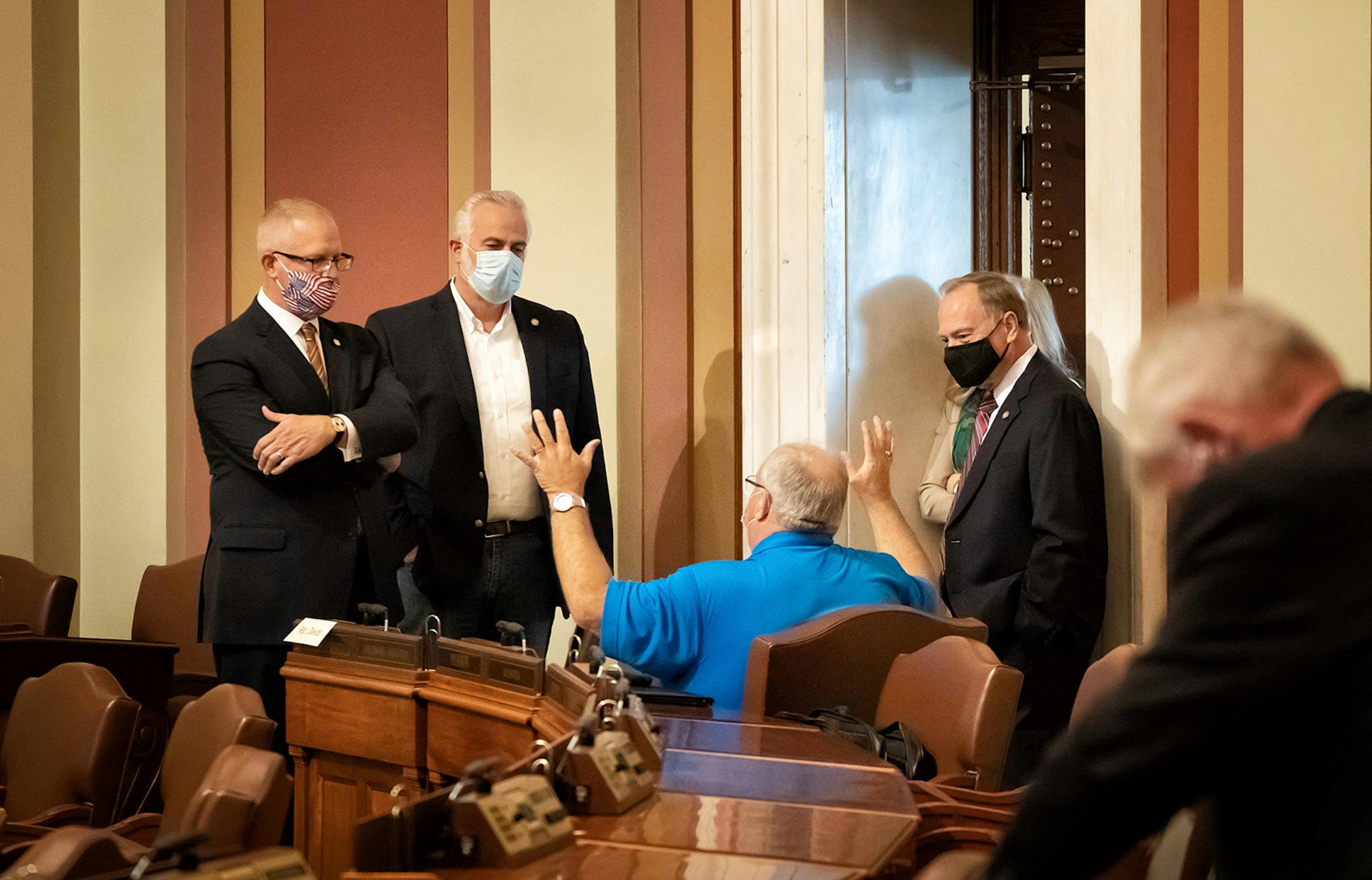 Republican legislators Rep. Jim Nash, R-Waconia, Rep. Tony Albright, R-Prior Lake, Rep. Peggy Scott, R-Andover and Rep. Bob Vogel, R-Elko New Market talked with Rep. Greg Davids, R-Preston, before the start of the Wednesday session. Davids is ranking Republican on the taxes committee.