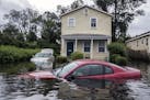 FILE -- A neighborhood in New Bern, N.C., flooded by Hurricane Florence on Sept. 15, 2018. Real estate markets are already feeling the effects of clim