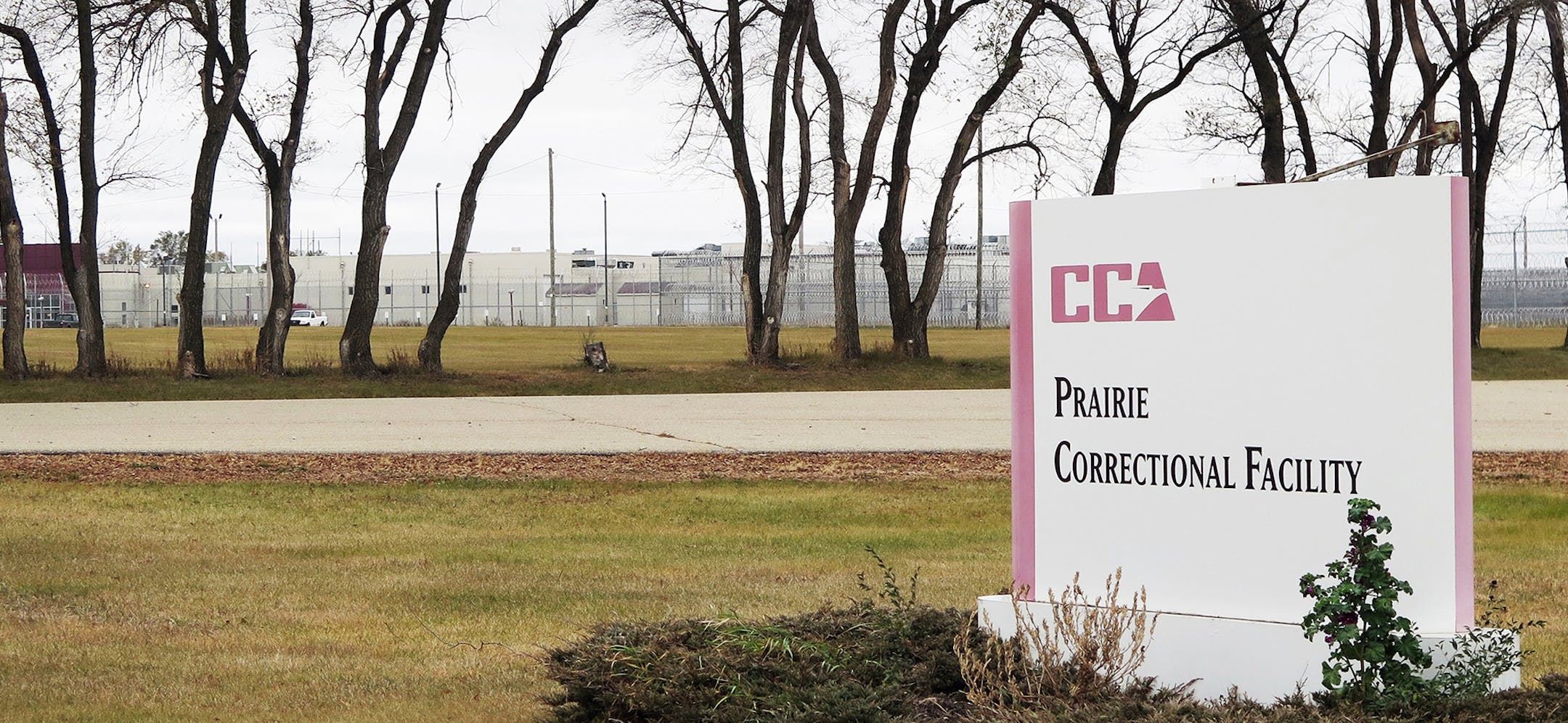 This photo taken Oct. 29, 2015, shows the entrance to the Prairie Correctional Facility, a private prison the closed in February 2010, in Appleton, Minn. State Republicans pushed legislation though a committee on Tuesday, March 26, 2016, to re-open the privately run prison in western Minnesota despite repeated interruptions from protesters who briefly halted debate as they pushed lawmakers to instead consider ways to decrease the state's prison population. (Mark Steil/Minnesota Public Radio via