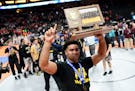 Apple Valley's Gable Steveson celebrated with the 3A state wrestling team championship title Thursday night after defeating Anoka. ] AARON LAVINSKY &#
