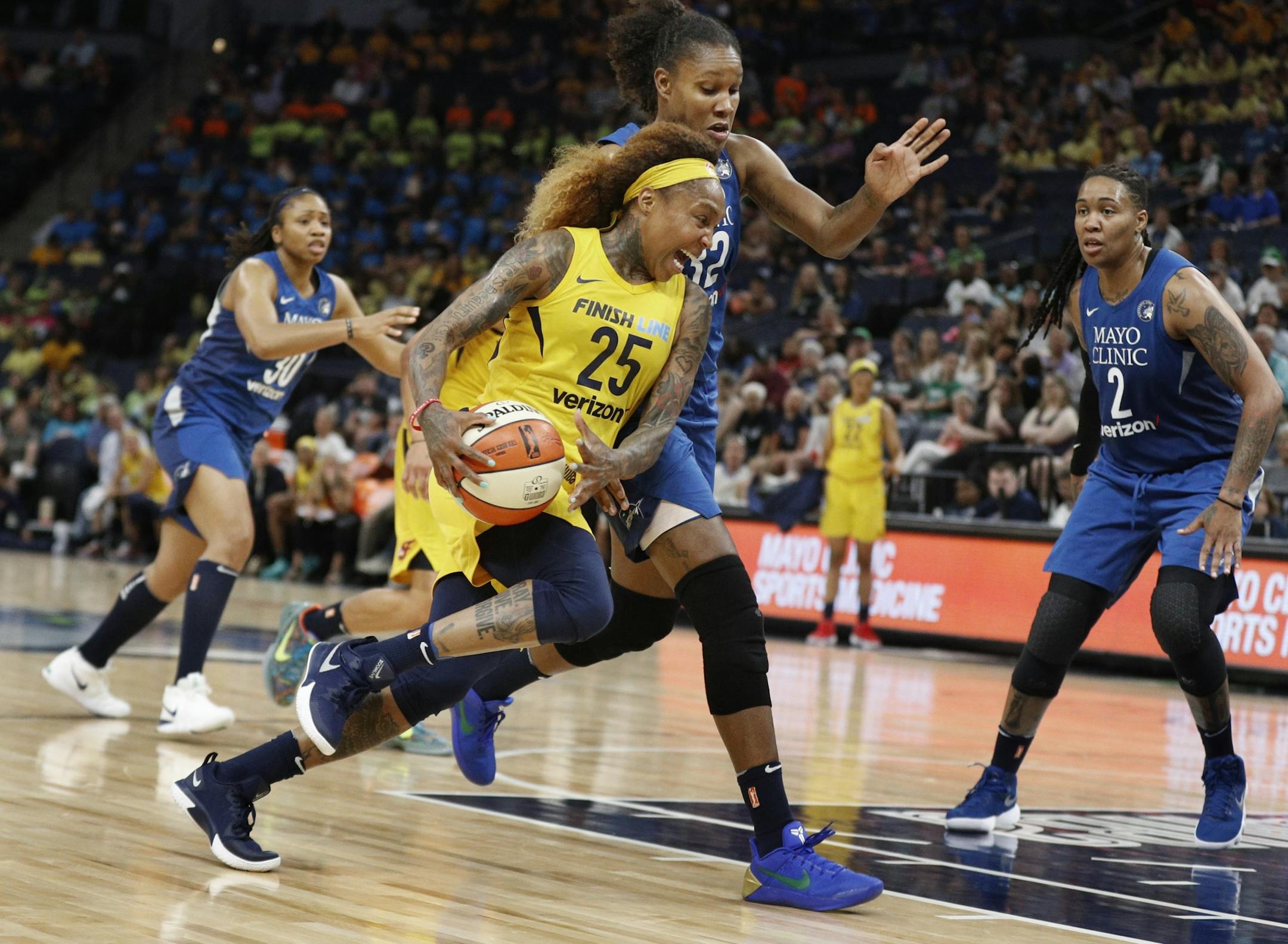 Fever Cappie Pondexter drove to the basket on Rebekkah Brunson at Target Center Wednesday July 18, 2018 in Minneapolis , MN.