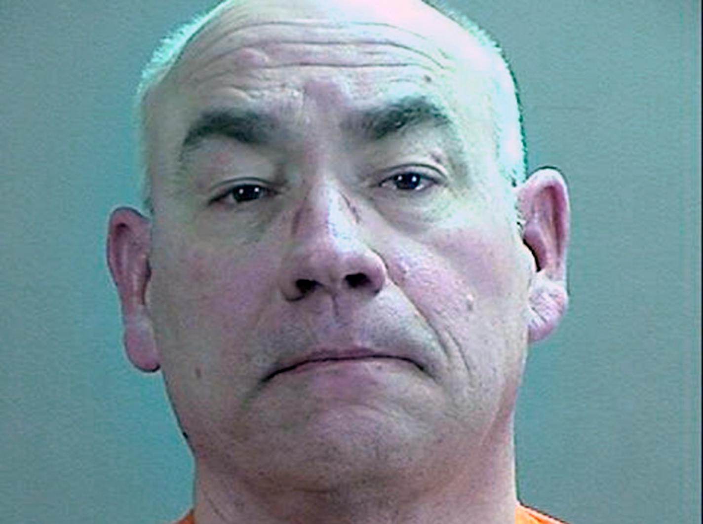 This photo released Wednesday, Oct. 28, 2015 by the Sherburne County Sheriff's Office, shows Daniel Heinrich. Heinrich was arrested on federal charges stemming from a long-term child exploitation investigation. The FBI says Heinrich is a "person of interest" in the 1989 abduction of Jacob Wetterling.