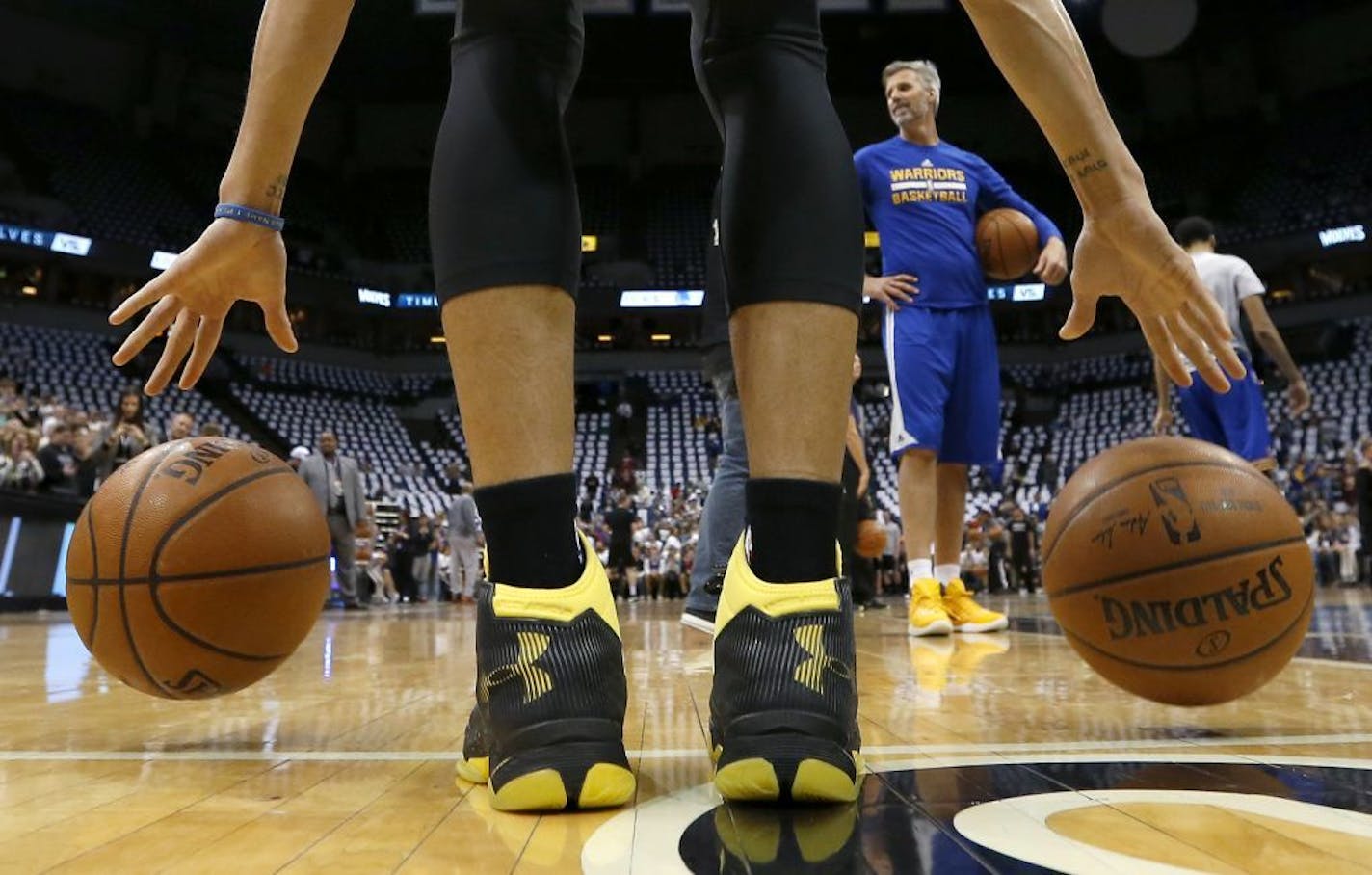 Golden State Warriors Steph Curry during his pregame warm up before Monday night's game at Target Center.