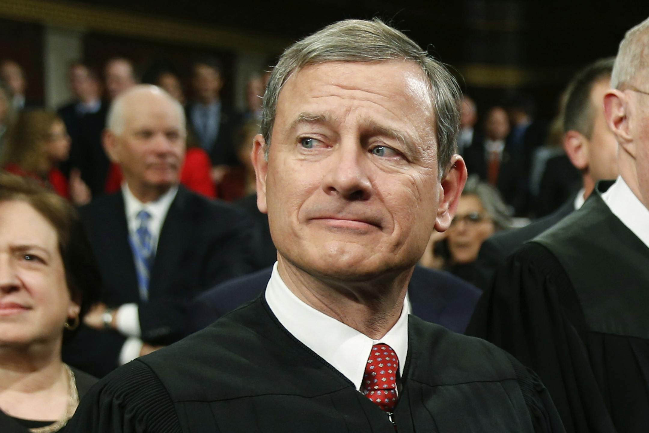 FILE - In this Jan. 12, 2016 file photo, Chief Justice John Roberts arrives for the State of the Union address to a joint session of Congress on Capitol Hill in Washington. Roberts, lately a fixture at the Senate impeachment trial of President Donald Trump, is expected to be among four Supreme Court justices at House of Representatives Tuesday evening for the president's State of the Union speech. (AP Photo/Evan Vucci)