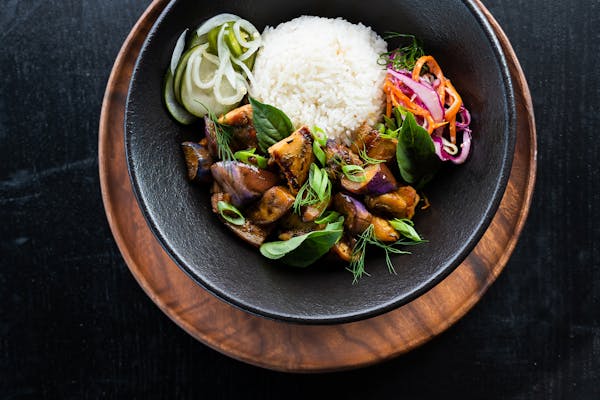 Thai Basil Chicken is on the menu at Mov, the new pop-up from chef Yia Vang. Credit: Lauren Cutshall