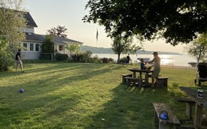 A vacation rental in Beulah, Mich., featured a glorious view of Lake Crystal, a wraparound porch and a big fenced-in yard.