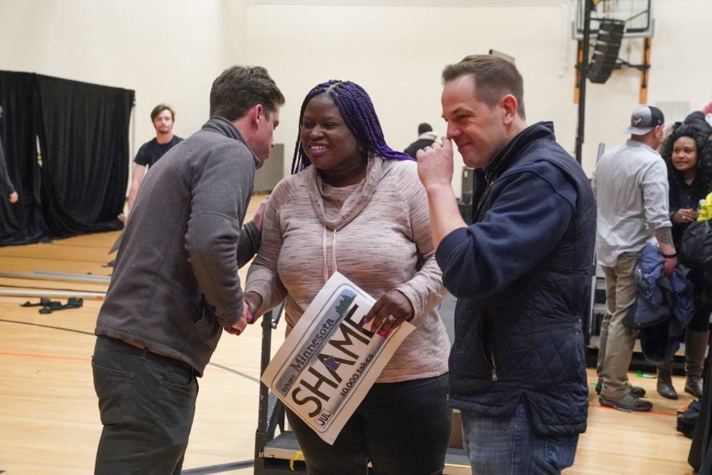 Klobuchar staffer Ben Hill and campaign director Justin Buoen talked with Nekima Levy Armstrong after the rally was cancelled. Levy Armstrong had been negotiating with them to end the protest and allow Klovuchar to take the stage. An announcement was made that the Amy Klobuchar event was cancelled. Crowds drifted away and protesters continued chanting Free Myon and Black Lives Matter. Campaign manager Justin Buoen tryed to broker a deal by claimed the protesters kept adding demands. Protesters d