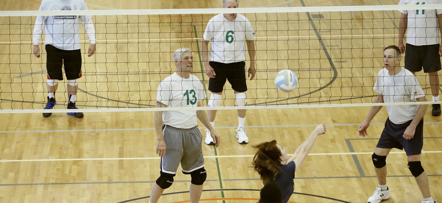 A group of senior citizens who call themselves "Born Again Jocks" played volleyball with sophomore students at Kennedy High school Monday March 2, 2015 in Bloomington, Minnesota. The team includes seniors who have been selected to play in the upcoming Senior Olympics this summer.] Jerry Holt/ Jerry.Holt@Startribune.com