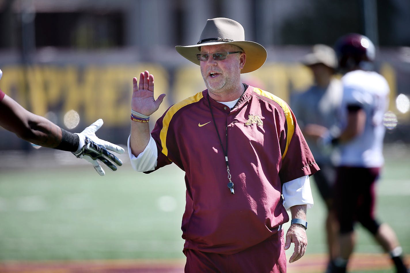 Minnesota's Jerry Kill sported a cowboy hat and music during practice, Tuesday, August 11, 2015 at Nagurski field at the U of M in Minneapolis, MN. ] (ELIZABETH FLORES/STAR TRIBUNE) ELIZABETH FLORES � eflores@startribune.com