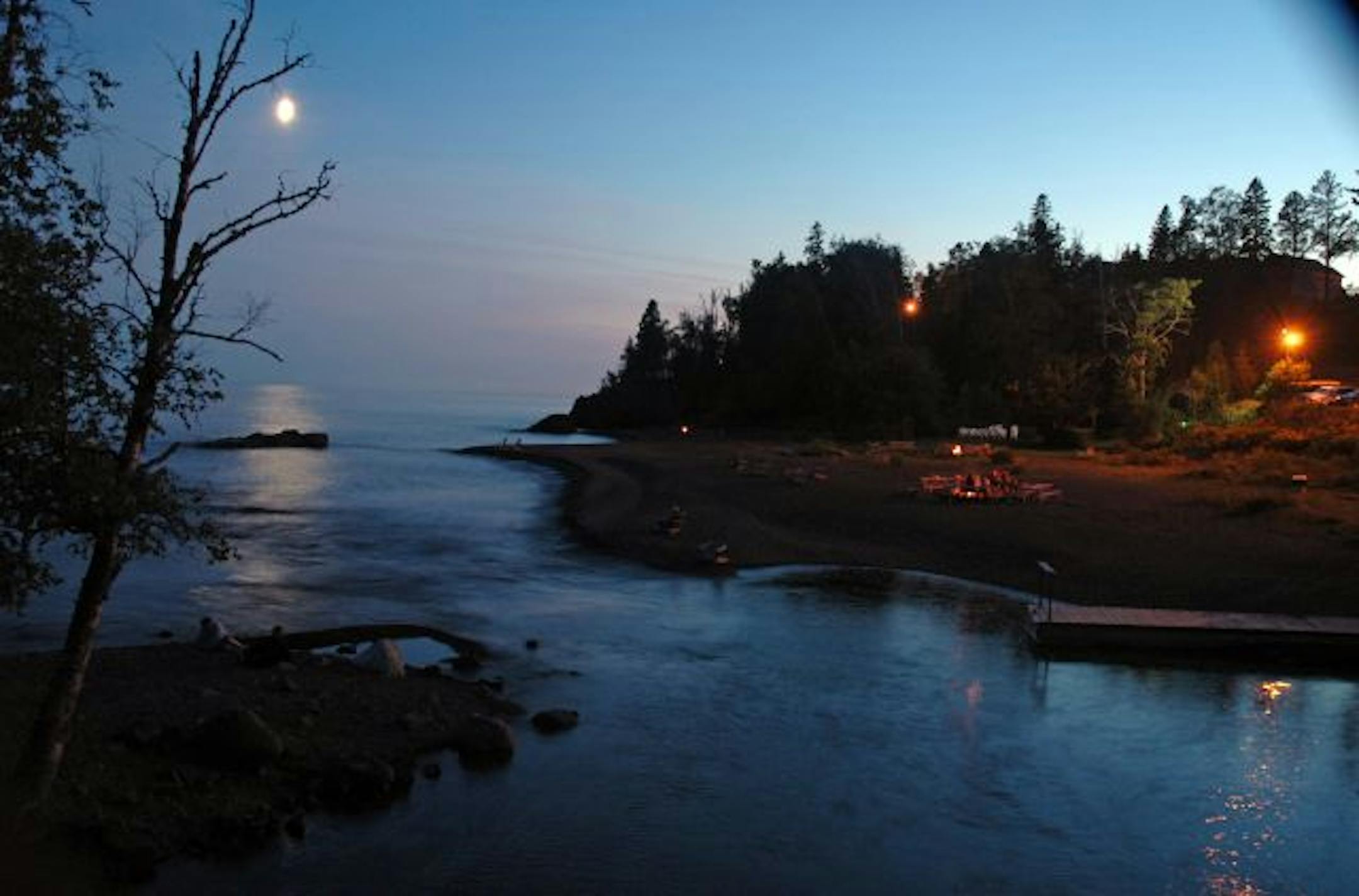 Nightly bonfires draw families to the beachfront at Lutsen Lodge and Resort.