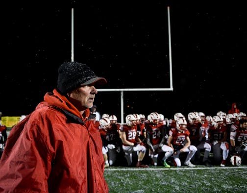 Centennial head coach Mike Diggins watched as his team lined up for his post-game speech following their 30-12 victory over Stillwater. ] AARON LAVINSKY &#xef; aaron.lavinsky@startribune.com Centennial played Stillwater in a Class 6A playoff football game on Friday, Oct. 27, 2017 at Centennial High School in Circle Pines, Minn.