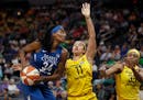Lynx center Sylvia Fowles scored one of her 18 points in the first half over Fever Natalie Achonwa at Target Center July 18.